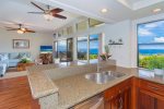 The remodeled kitchen comes complete with ocean views